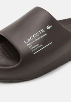 Lacoste Serve SlideCiabattineDark Brown/Light Turquoise Uomo Scarpe Aperte LA212G015-O11 -Luce Scarpe Negozio 829437742d6740a387096415900eb947