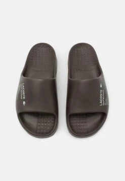 Lacoste Serve SlideCiabattineDark Brown/Light Turquoise Uomo Scarpe Aperte LA212G015-O11 -Luce Scarpe Negozio b4076c014ff14f14845a50bcc43966db